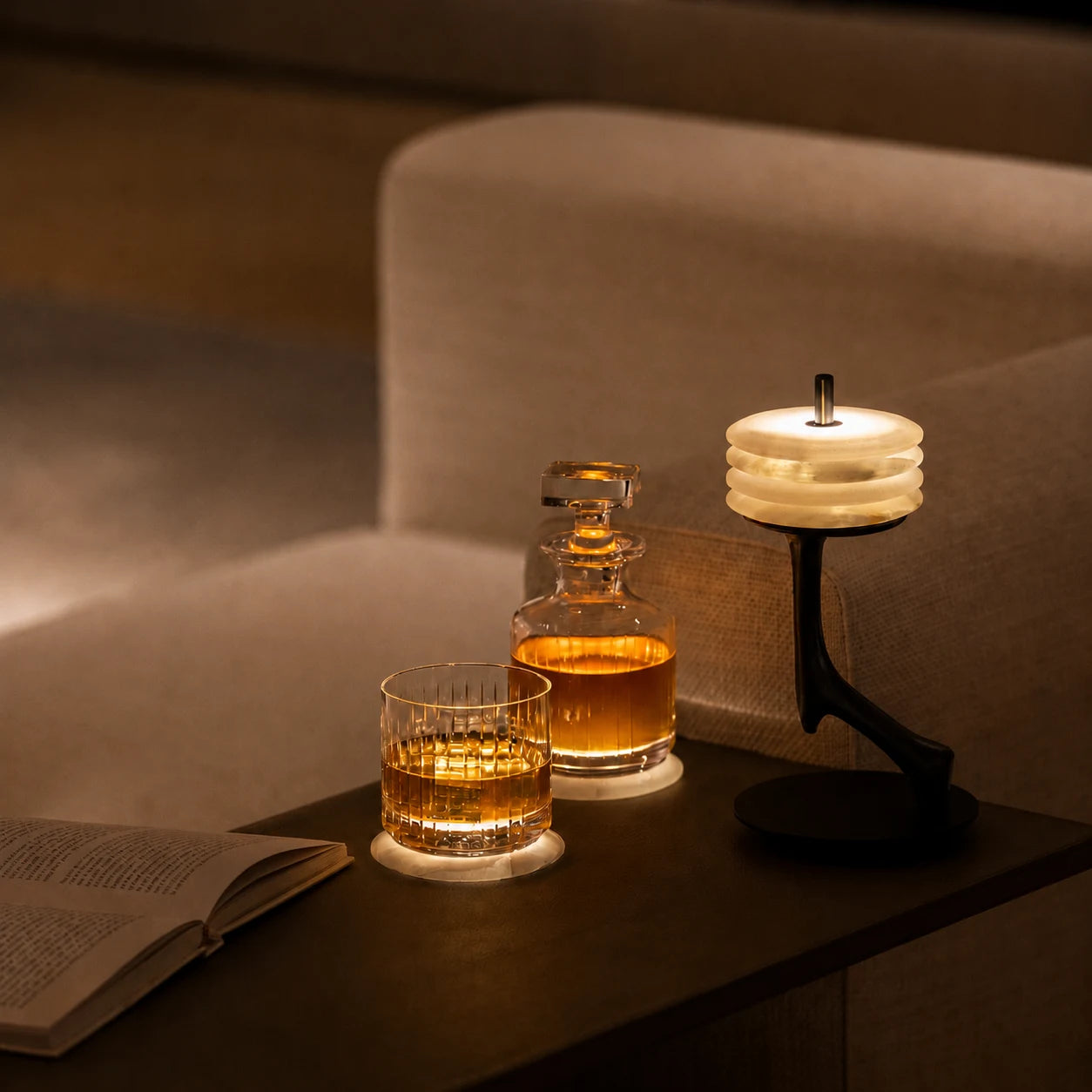 Warm evening ritual with glassware and lamp